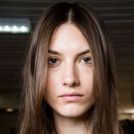 Side or split in half? See how your hair parting influences your face shape
