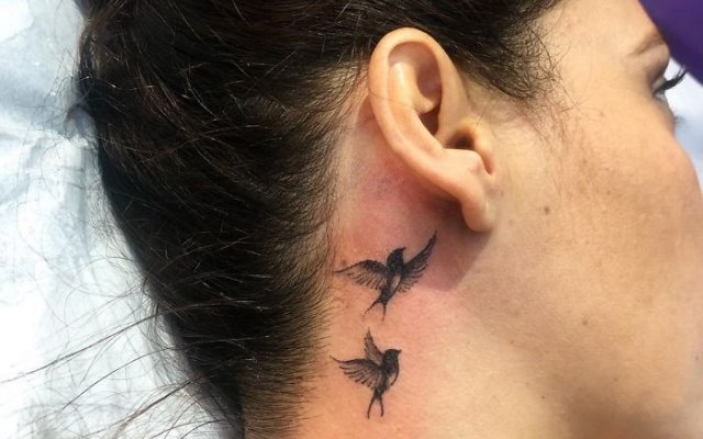 Echa un vistazo a 65 imágenes de tatuajes femeninos en el cuello