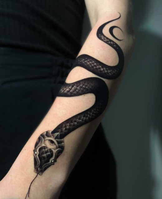 See the best snake tattoos for women