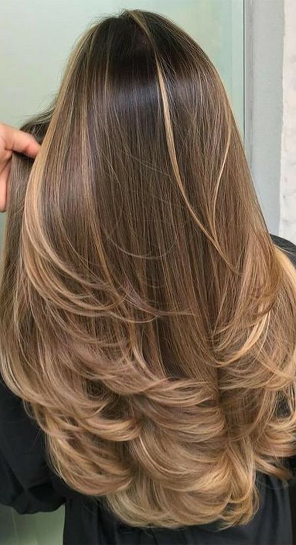 Voir les meilleures coupes de cheveux pour cheveux longs