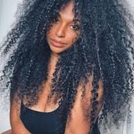 Black hair favors which skin tones?