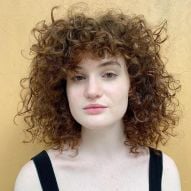 Curly bangs: how to cut, finish, choose the best type + 10 inspiration photos