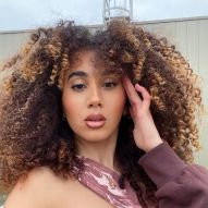 25 beautiful photos of a lit brunette with curly hair and black skin