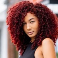 Red hair on brown skin: which colors suit skin tone