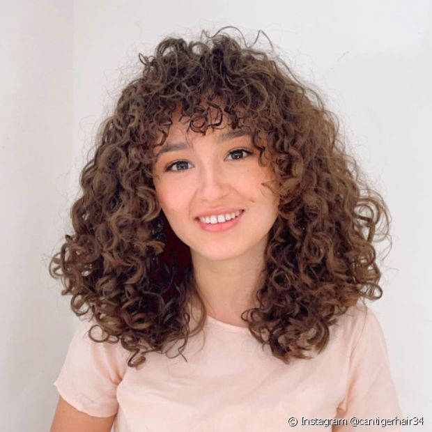 25 before and after photos of curly cuts with bangs