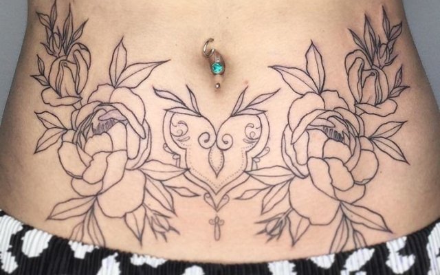 Get inspired with ideas and learn all about belly tattoos.