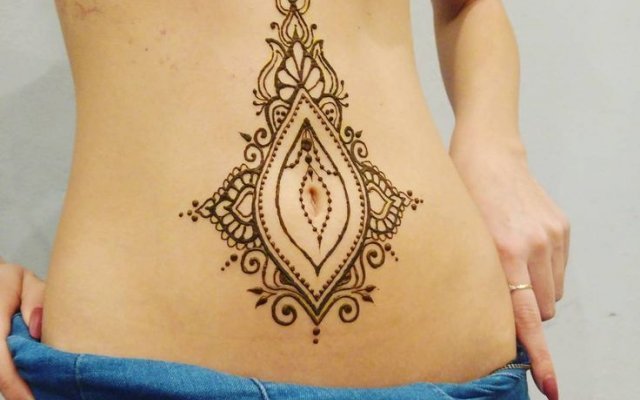 Get inspired with ideas and learn all about belly tattoos.